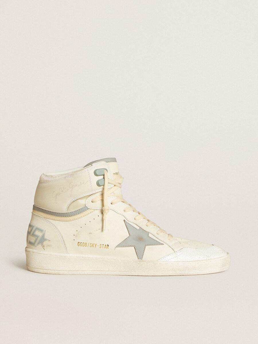 heren sky-star in leer met lichtblauwe leren ster en witte hielband.