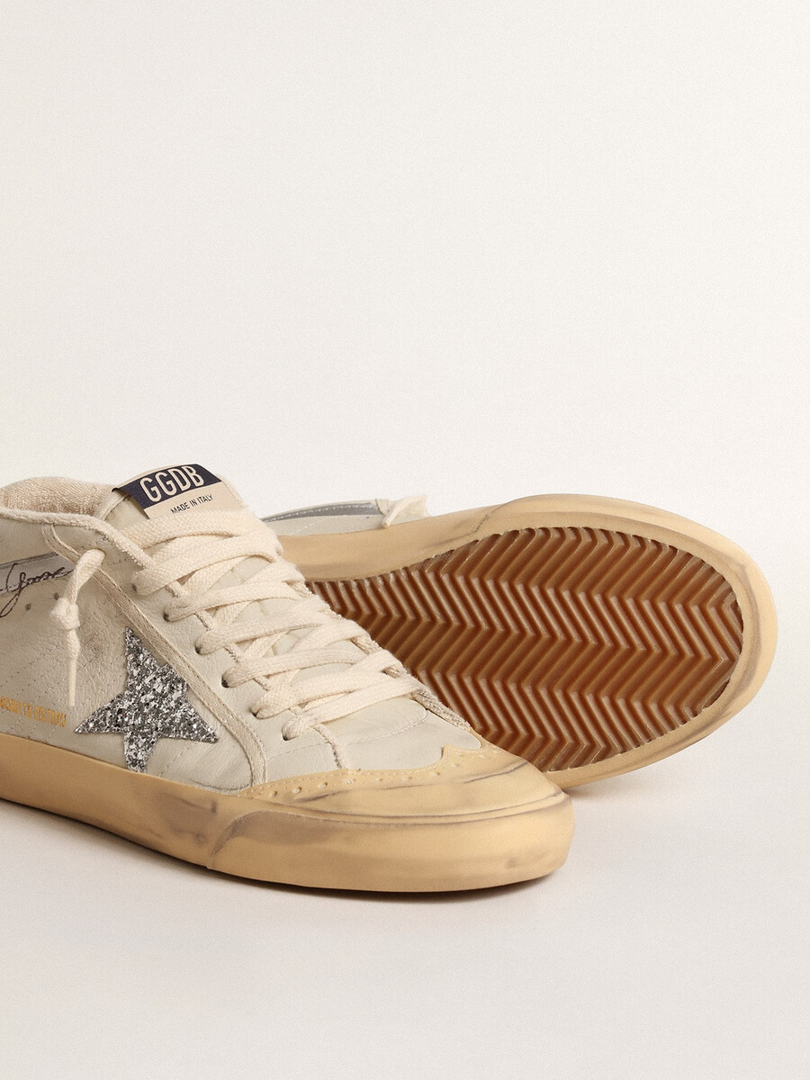 mid star met glitterster en metallic leren accenten