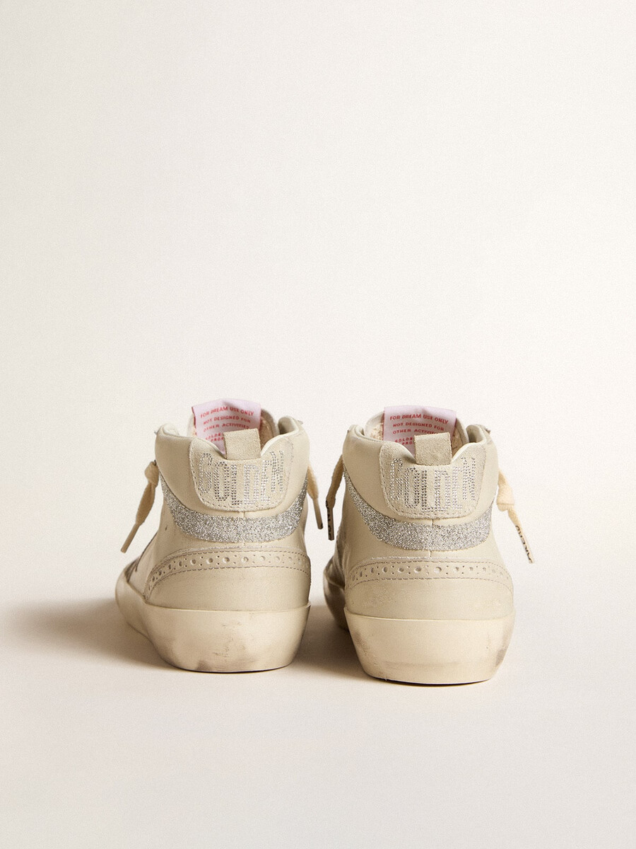 dames mid star ltd met bronzen leren ster en swarovski-kristallen.