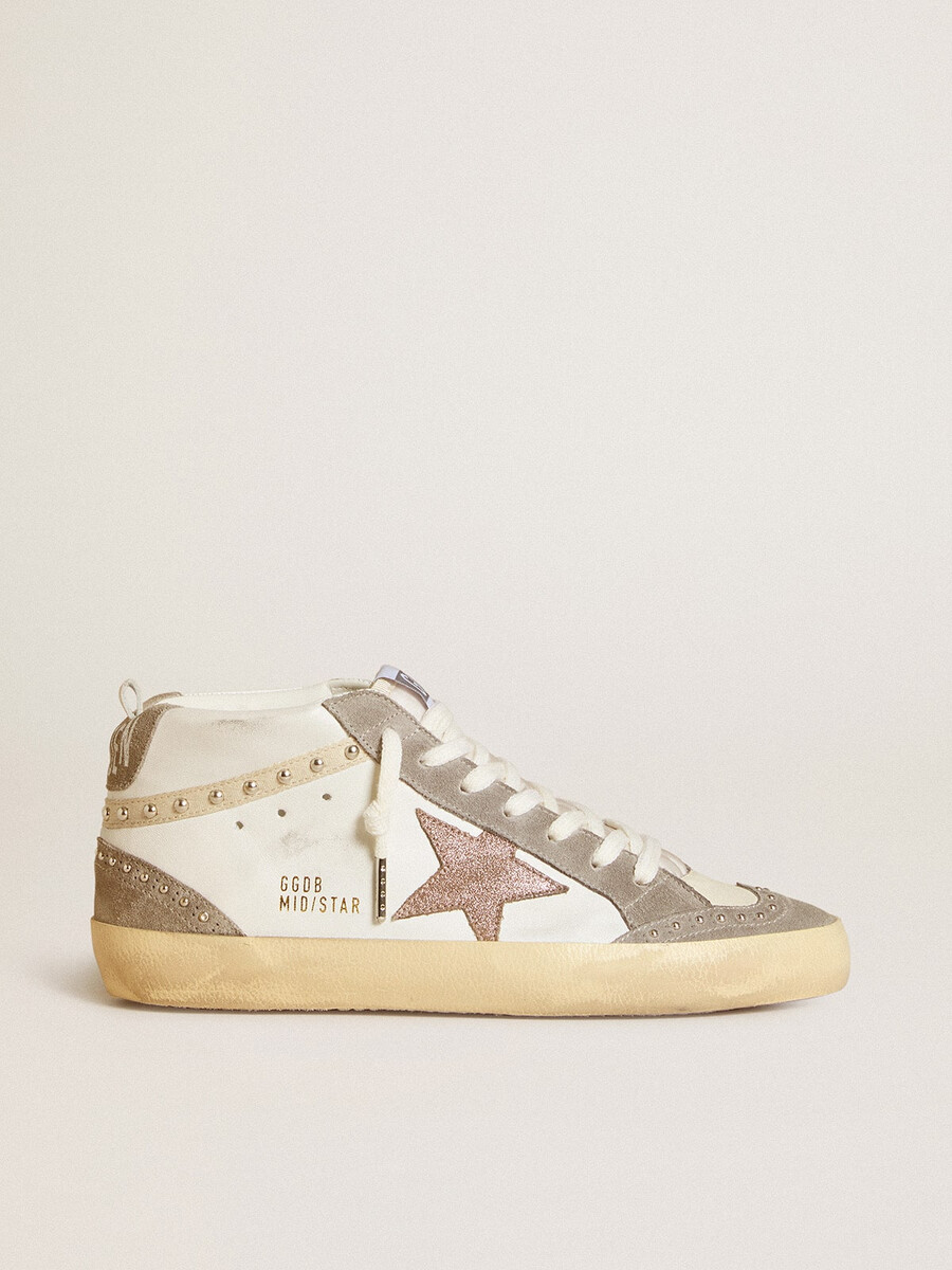 dames mid star in nappa en suède met een lichtbruine metallic leren ster.