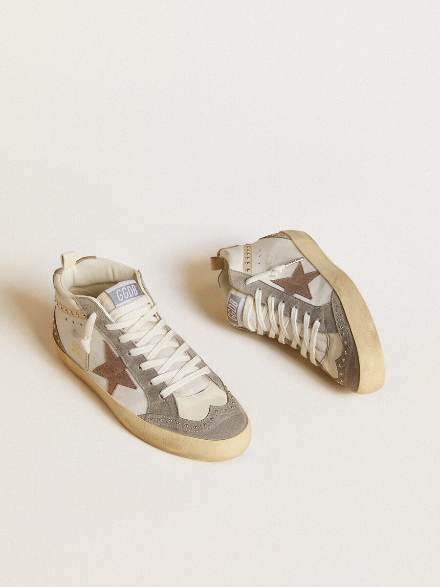 dames mid star in nappa en suède met een lichtbruine metallic leren ster.
