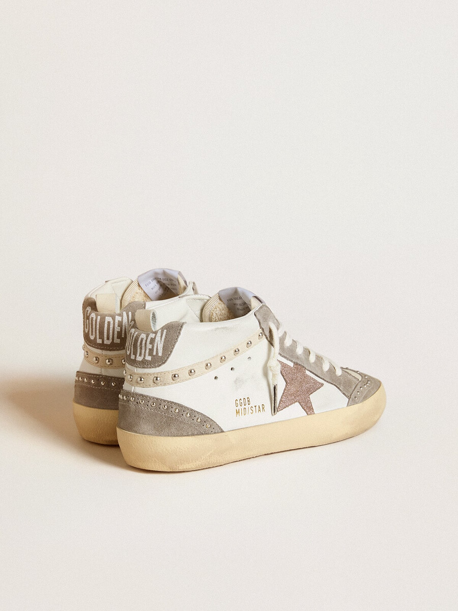 dames mid star in nappa en suède met een lichtbruine metallic leren ster.