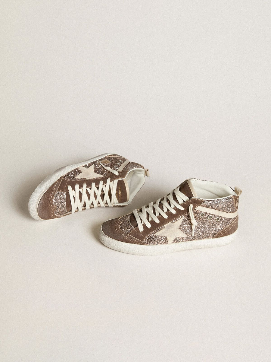 dames mid star in glitter met parelmoer suède ster en bruine suède inzetstukken.