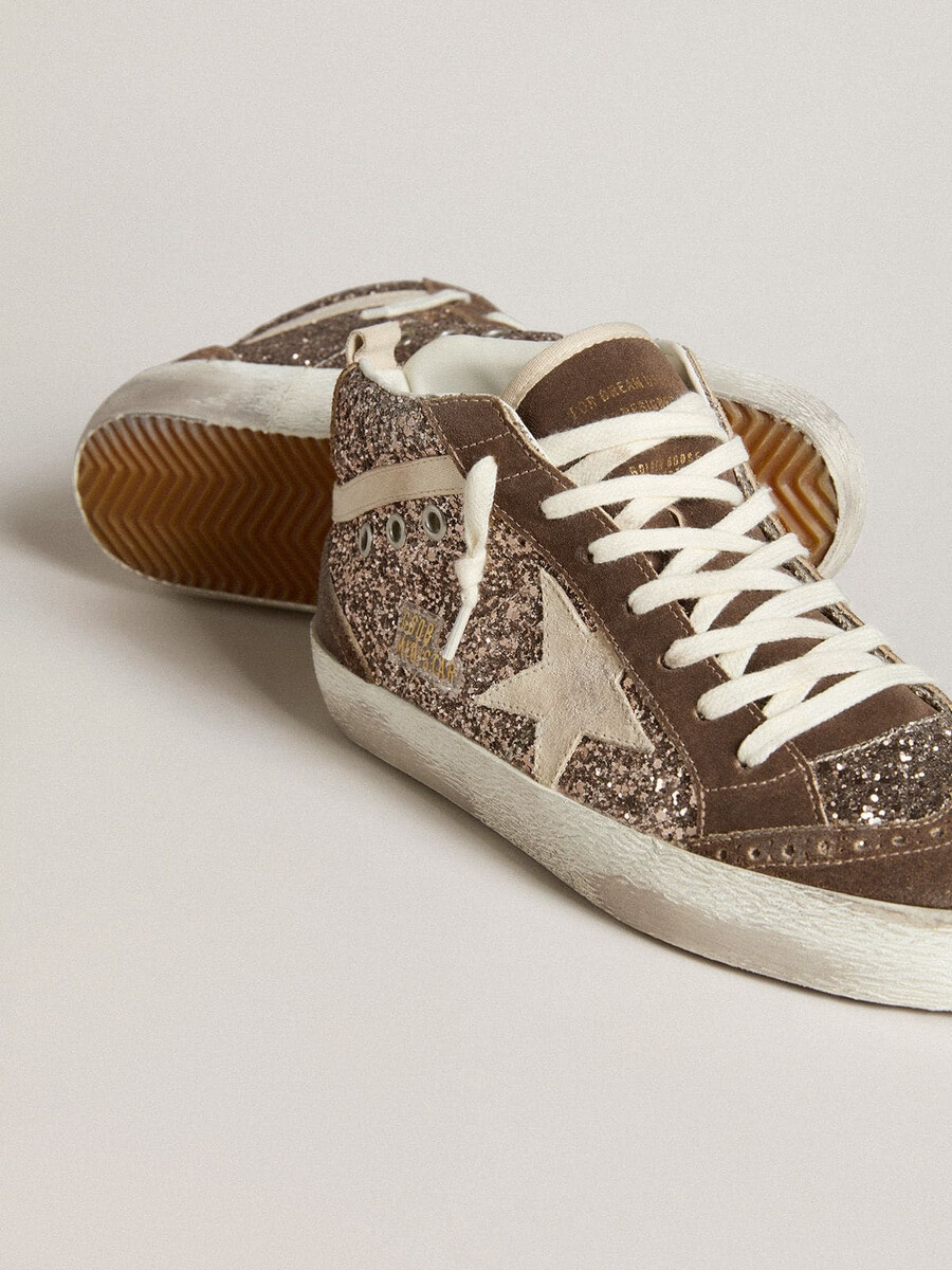 dames mid star in glitter met parelmoer suède ster en bruine suède inzetstukken.