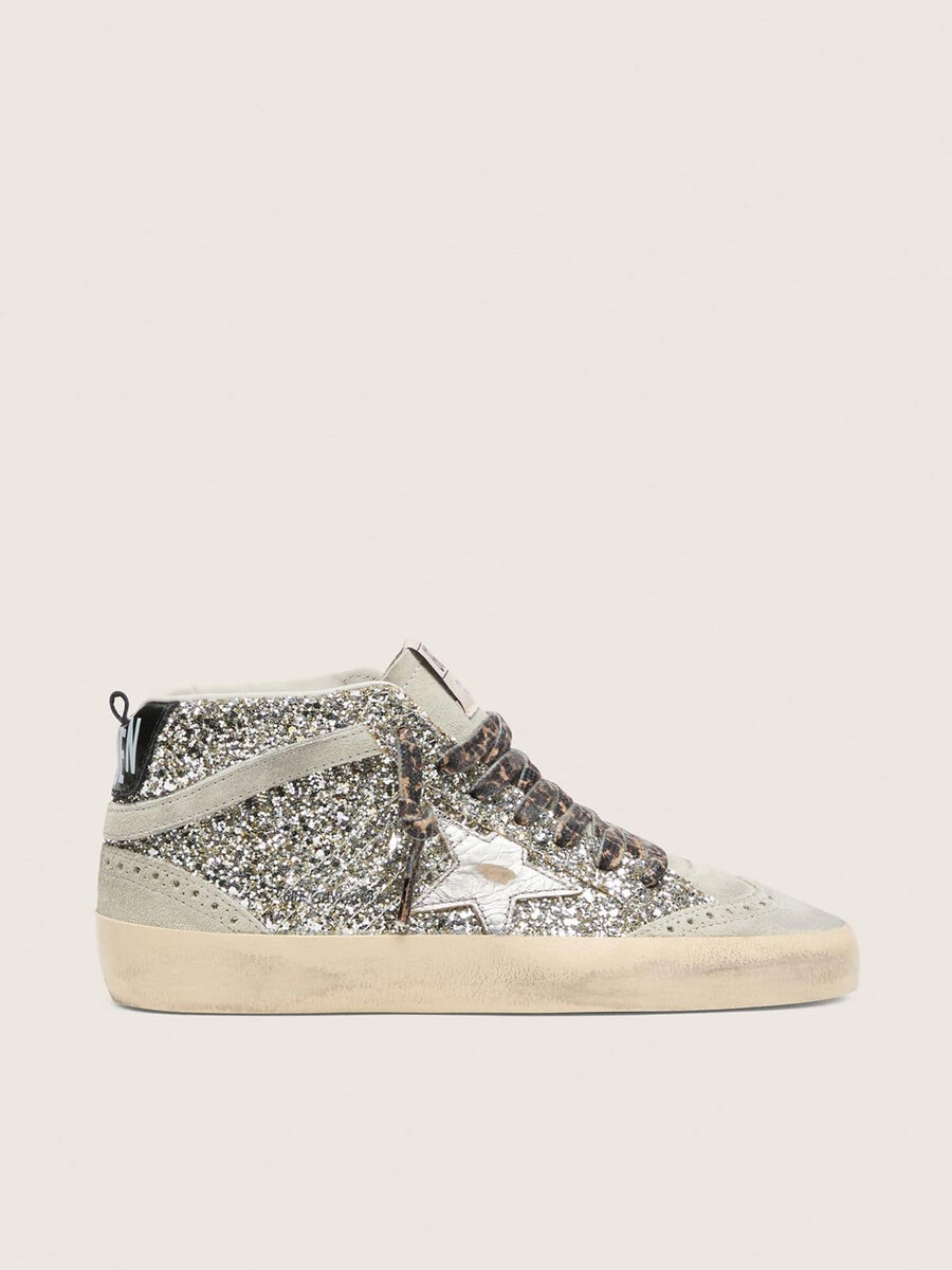 mid star in zilveren glitter met een ster van zilverkleurig metallic leer.