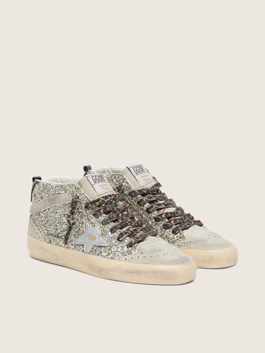 mid star in zilveren glitter met een ster van zilverkleurig metallic leer.