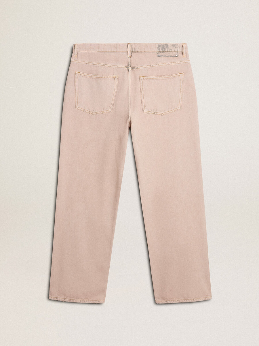 roze geverfde herenjeans