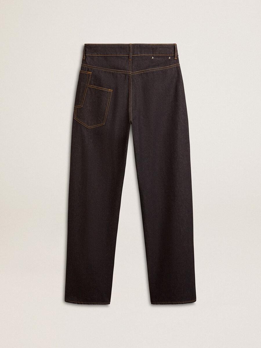 donkerblauwe herenjeans met wijde pijpen van denim met een lichte wassing.