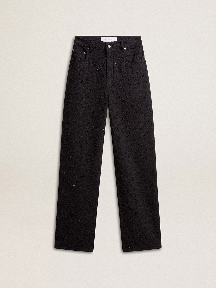 damesbroek van katoenen denim met versiering van kristallen en stenen.