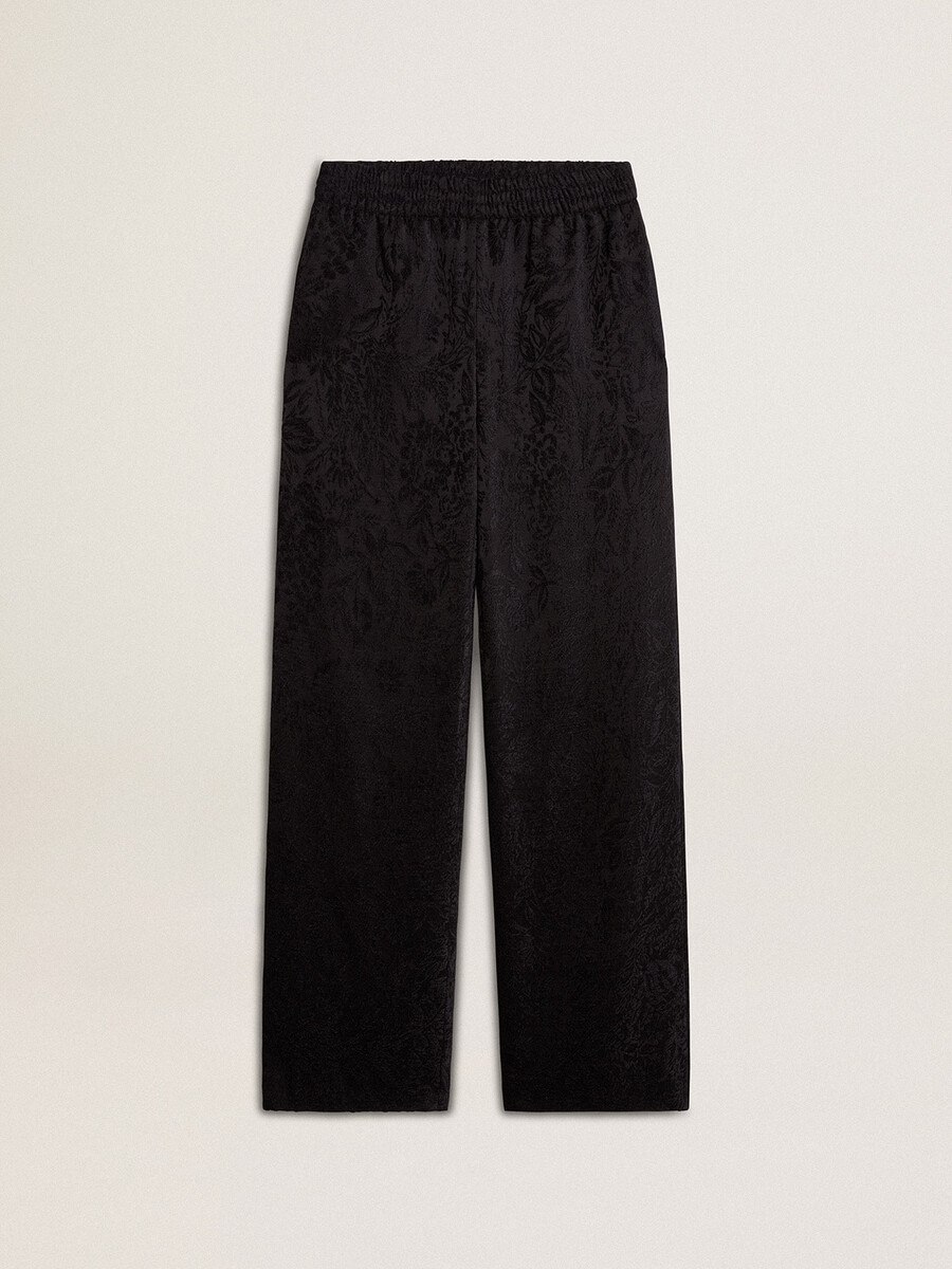 zwarte joggingbroek voor dames met een ton-sur-ton toile de jouy-print.