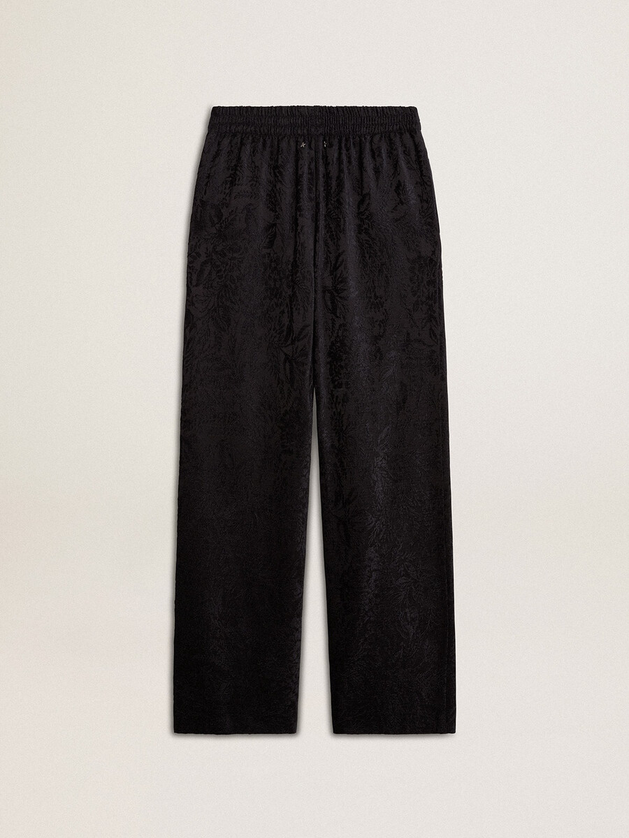 zwarte joggingbroek voor dames met een ton-sur-ton toile de jouy-print.