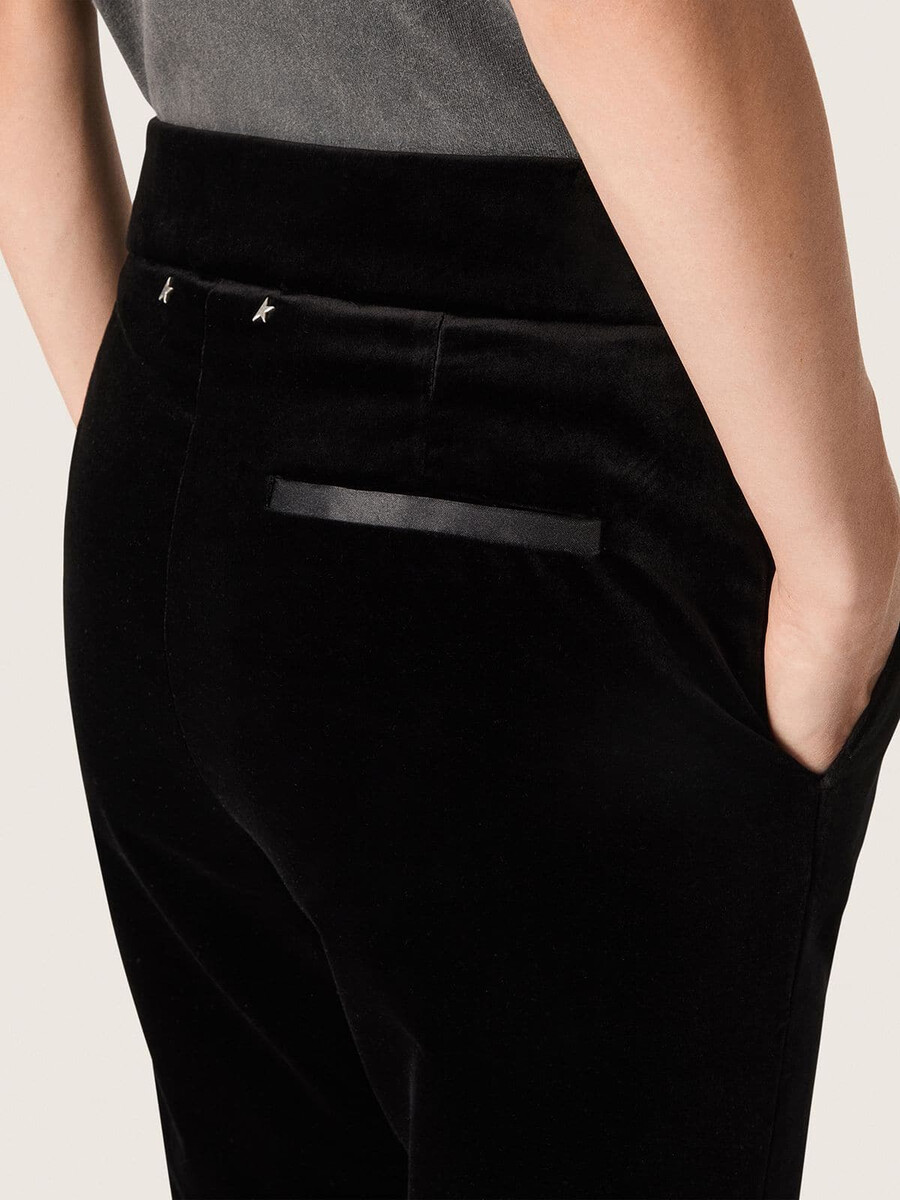 nauwsluitende flared broek voor dames van zwart katoenfluweel