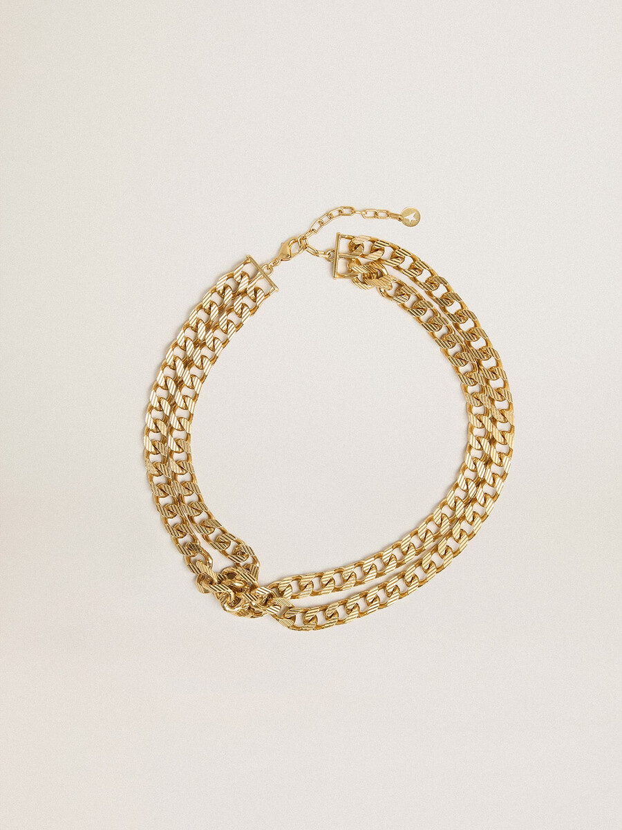 antieke goudkleurige gevlochten ketting met stervormige sluiting