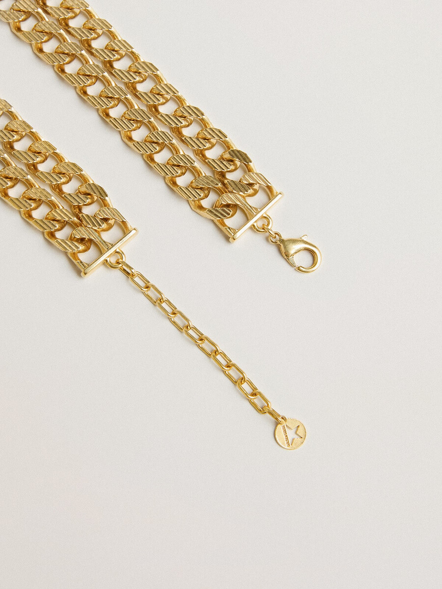 antieke goudkleurige gevlochten ketting met stervormige sluiting