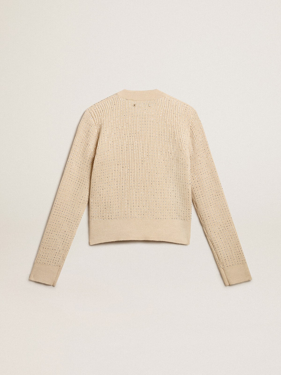 korte trui met ronde hals van beige wol volledig bedekt met kristallen.