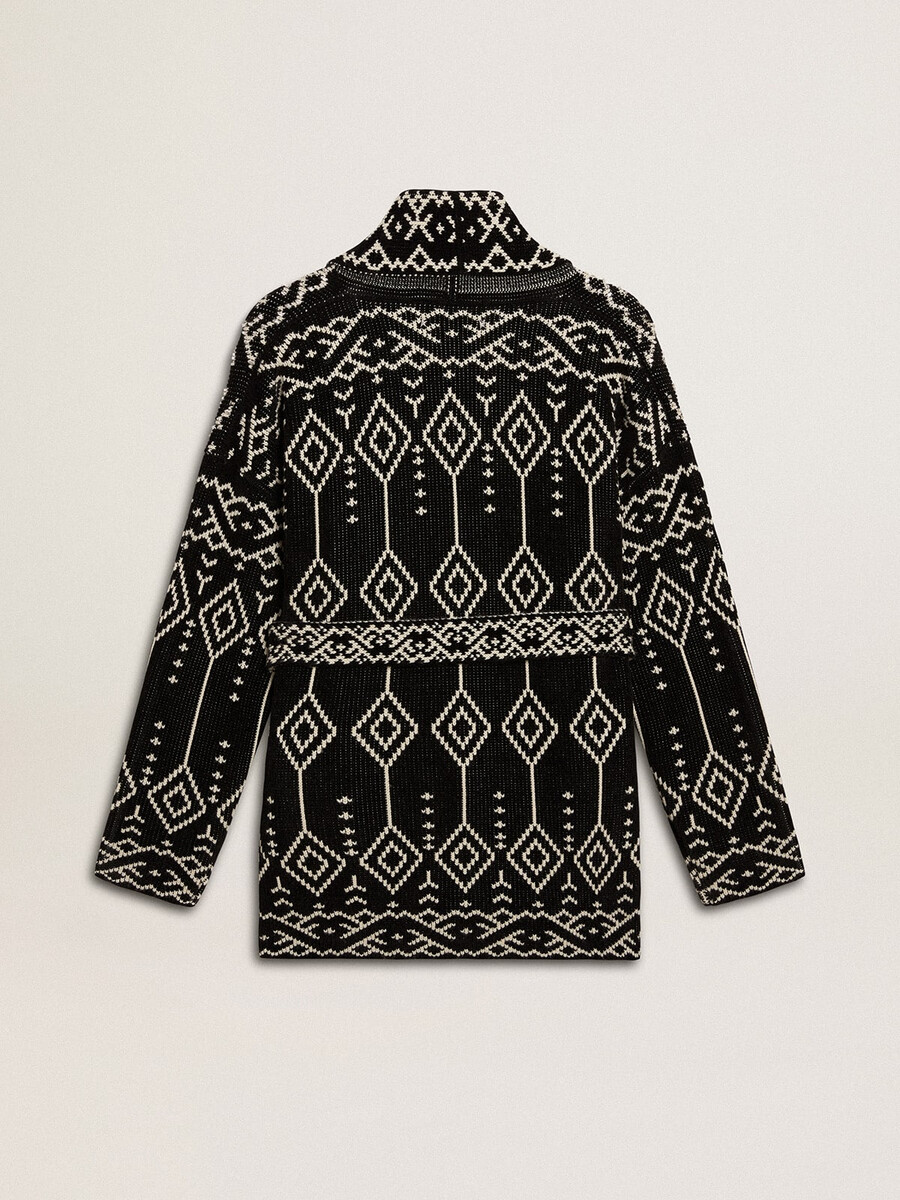 zwart damesvest met riem en kristallen.