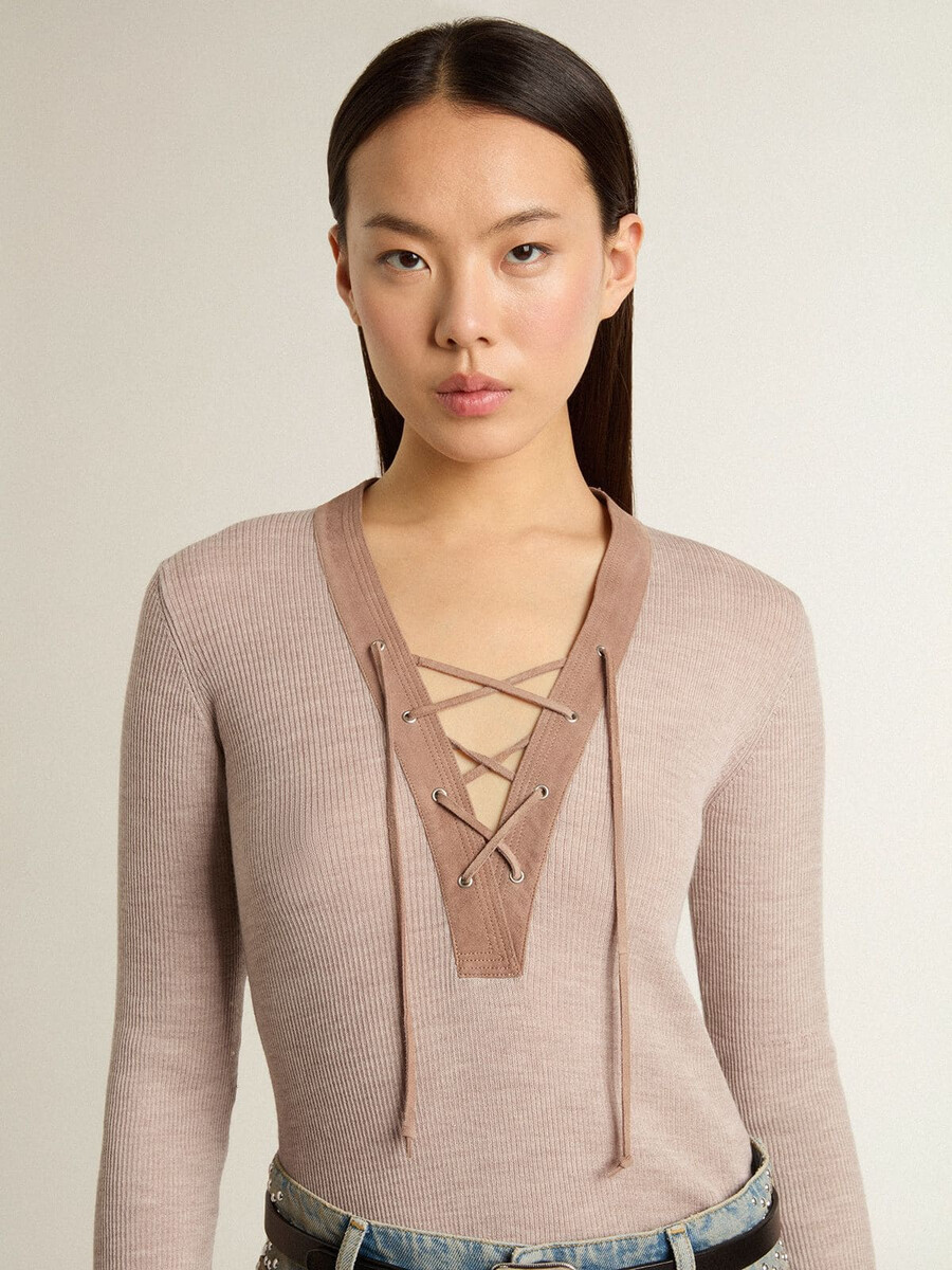 beige wollen trui met leren details