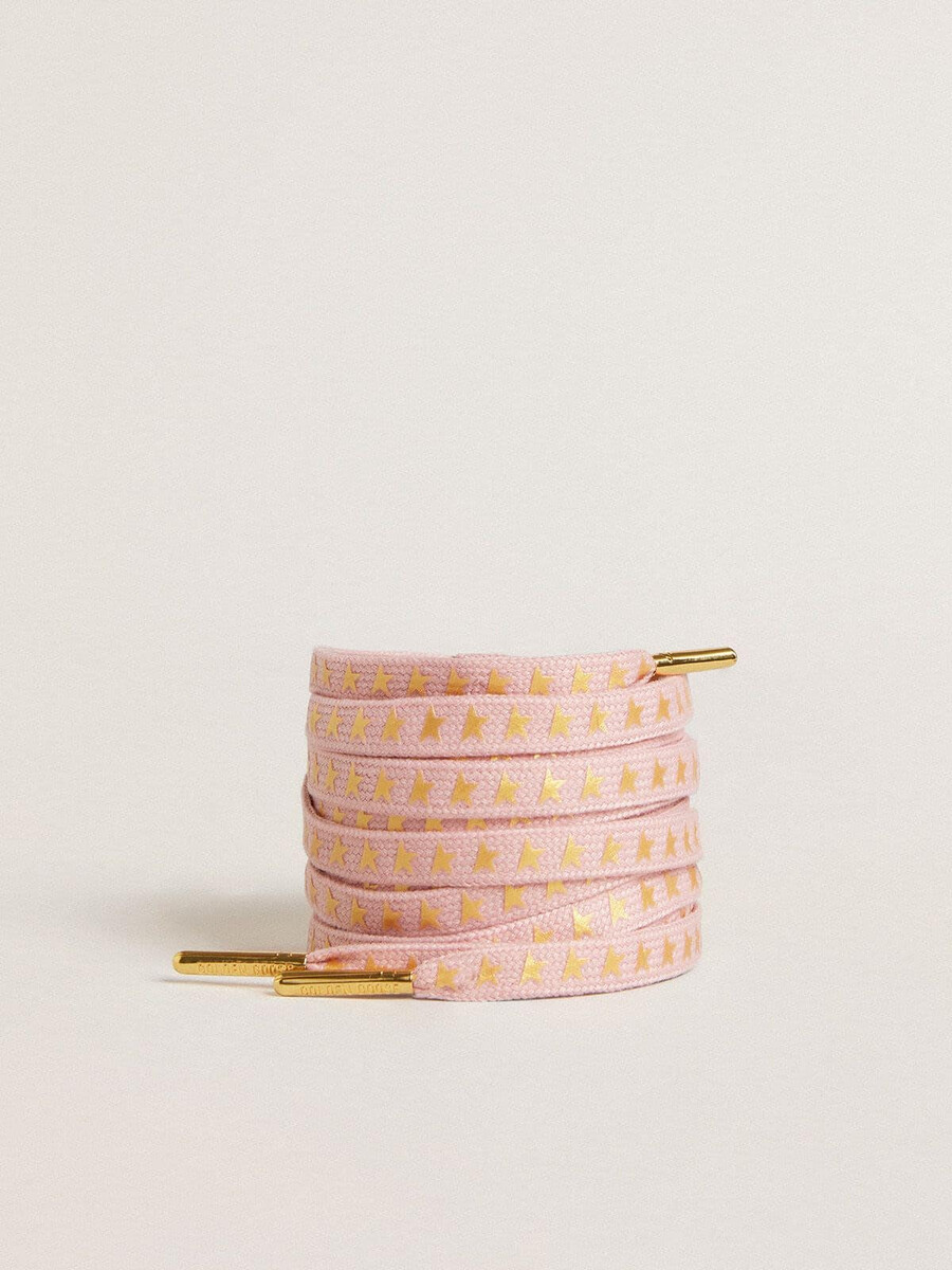 roze katoenen veters met contrasterende gouden sterren