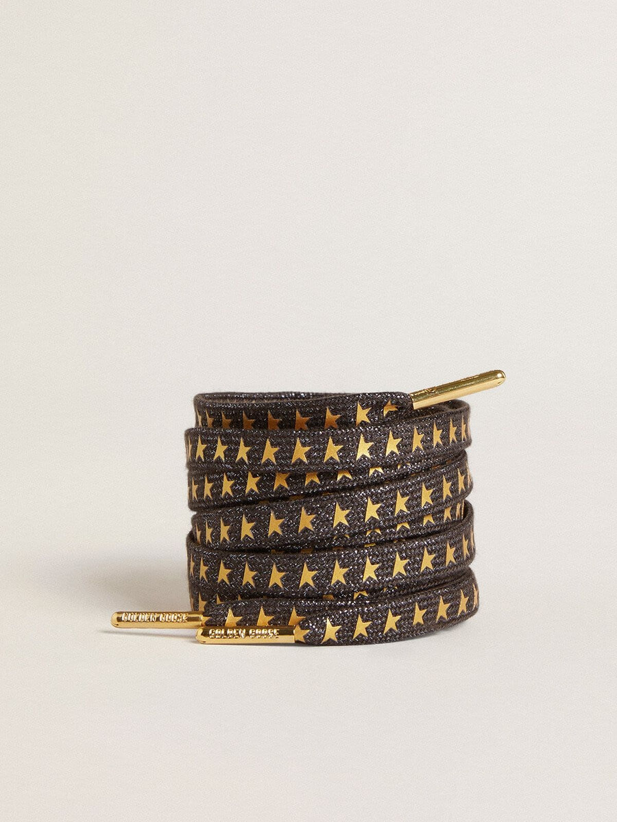 donkergrijze lurex-veters met contrasterende gouden sterren