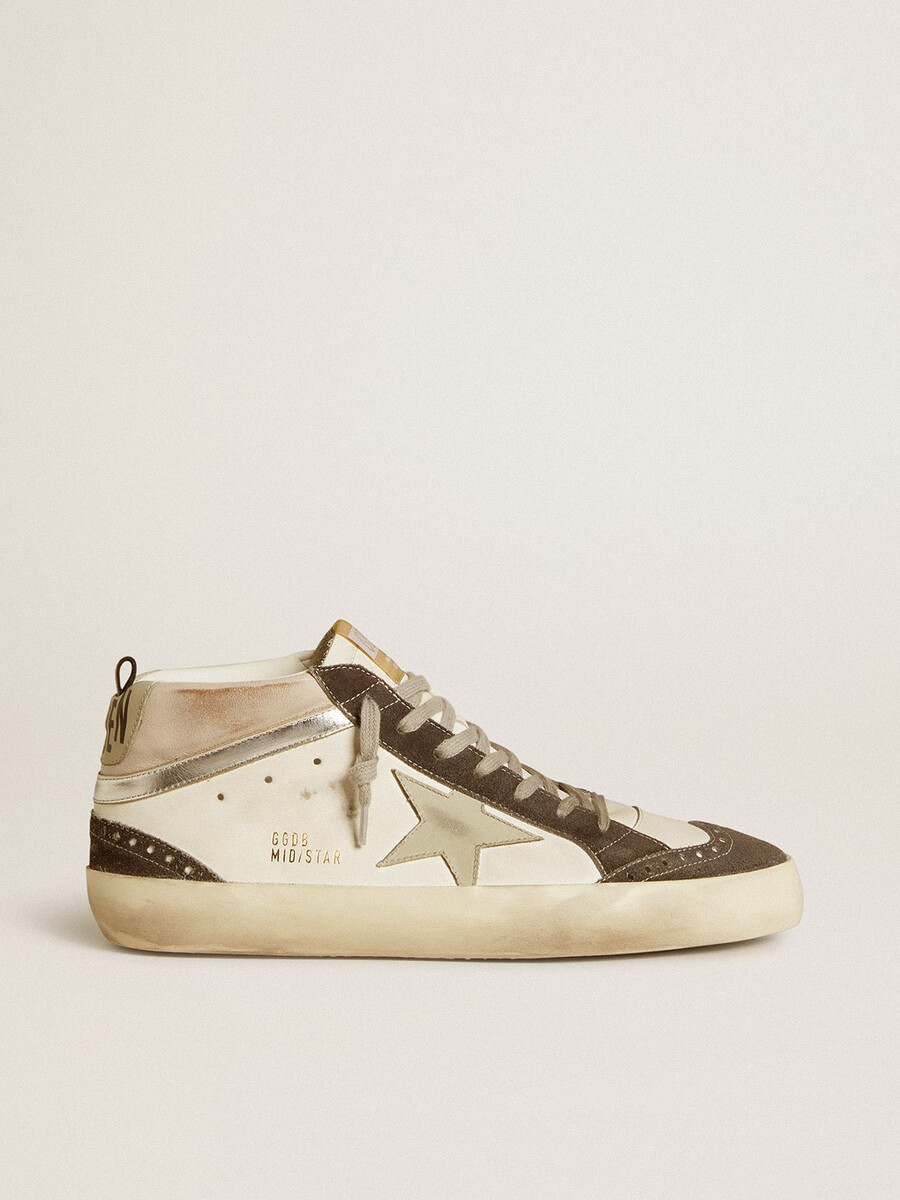 mid star met grijze leren ster en metallic zilveren leren accent.