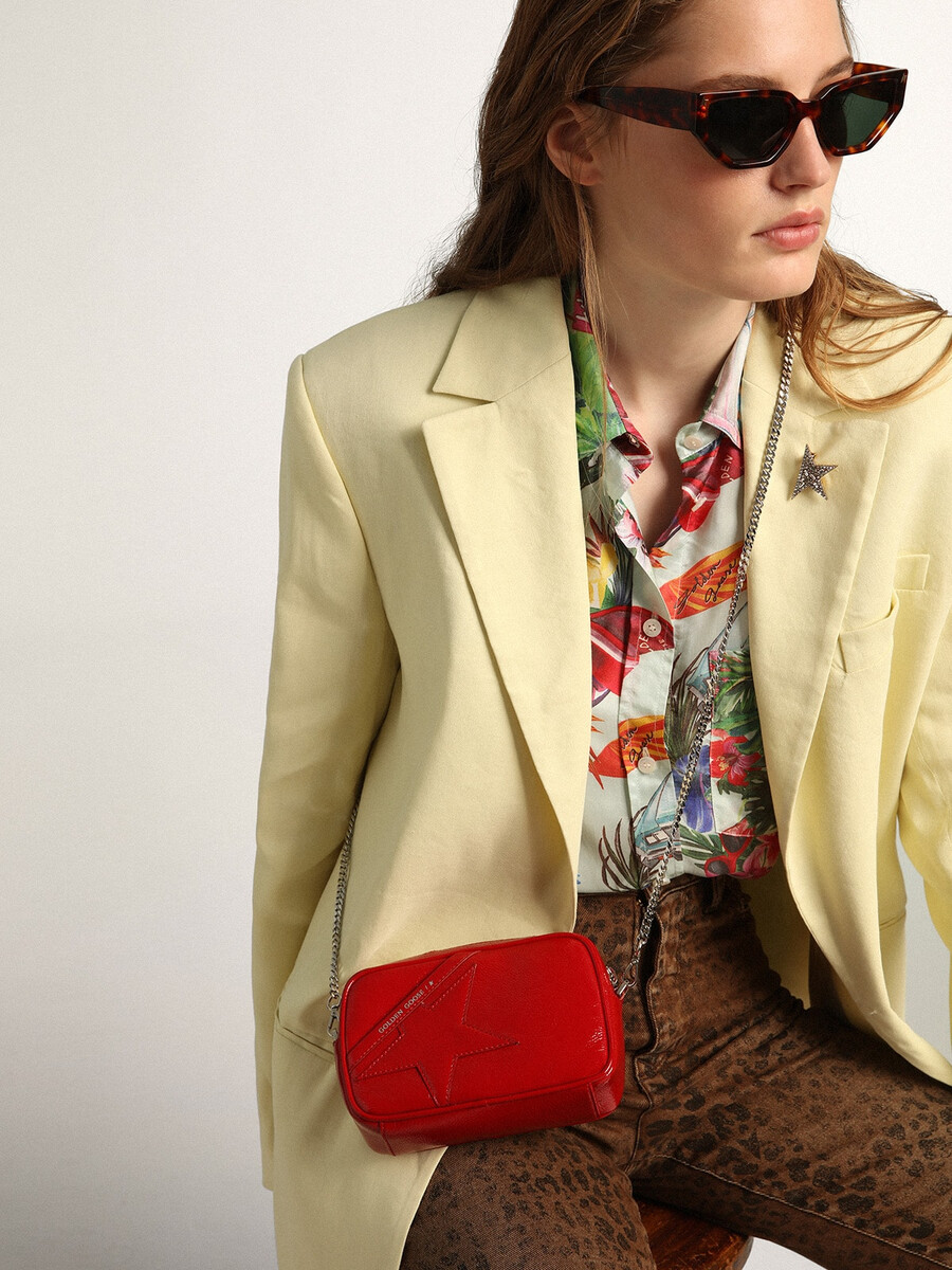 mini star-tas voor dames in rood geverfd leer met een ton-sur-ton ster.
