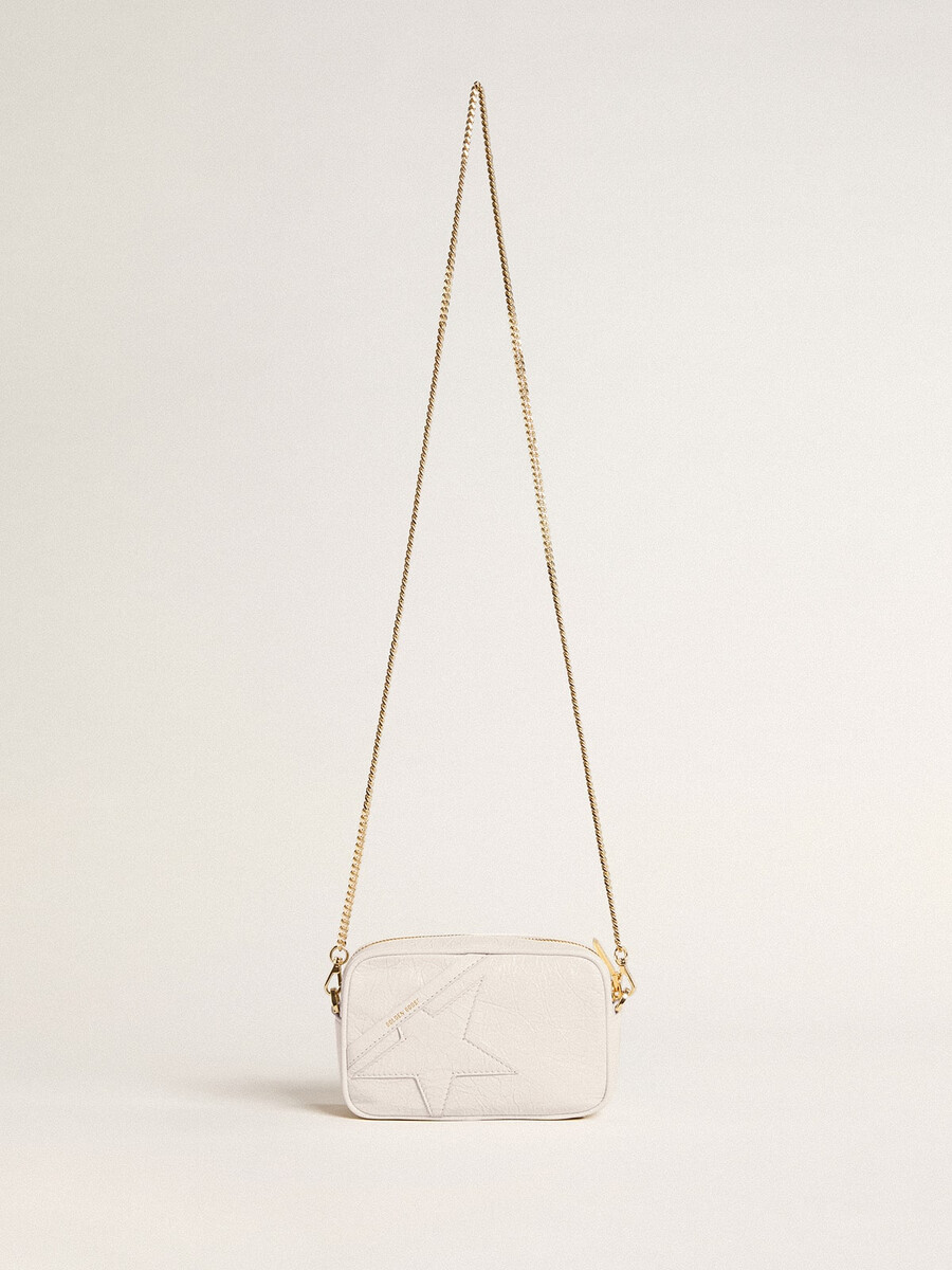 mini star bag van boterwit leer met een ton-sur-ton ster.