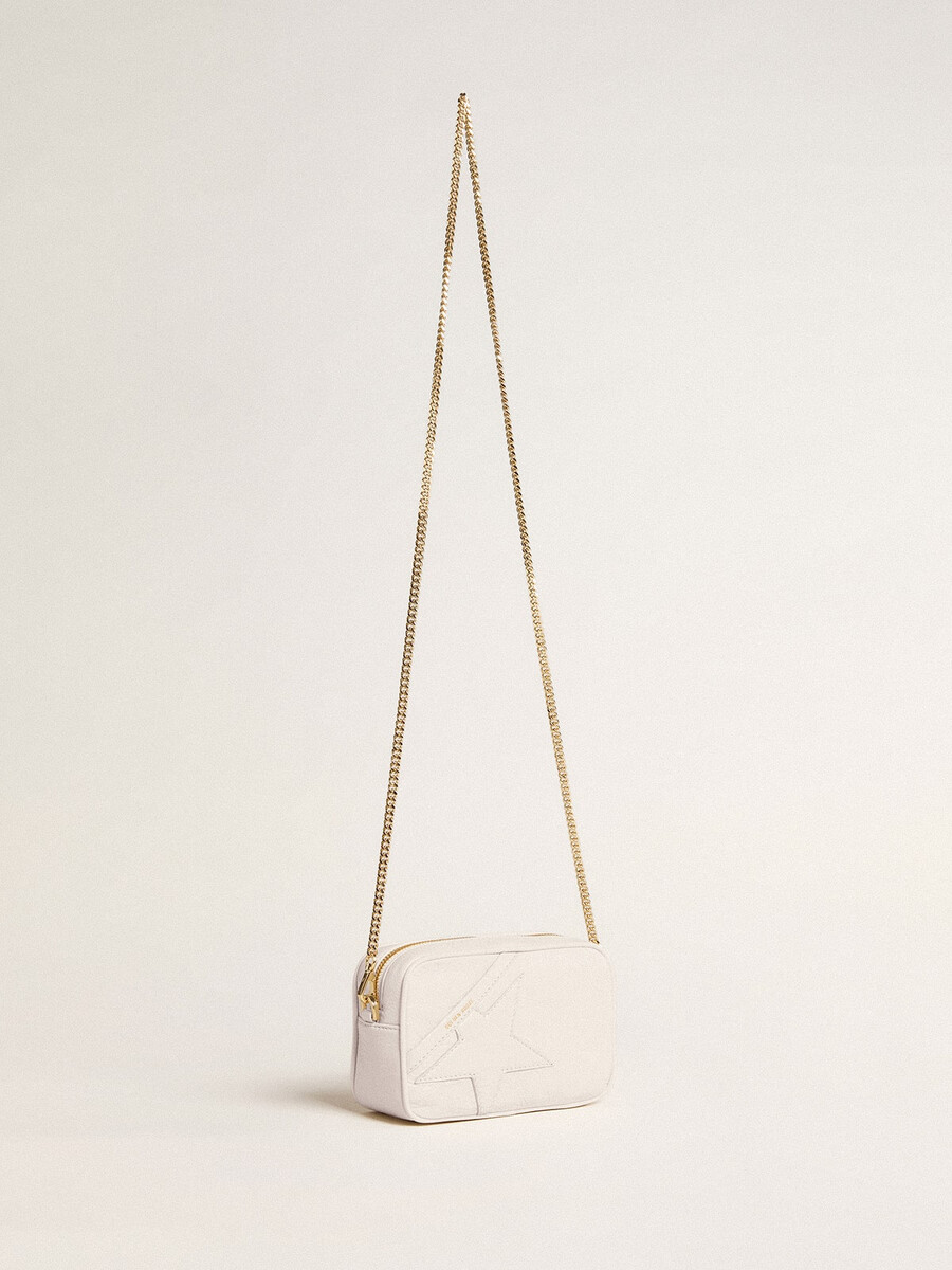 mini star bag van boterwit leer met een ton-sur-ton ster.