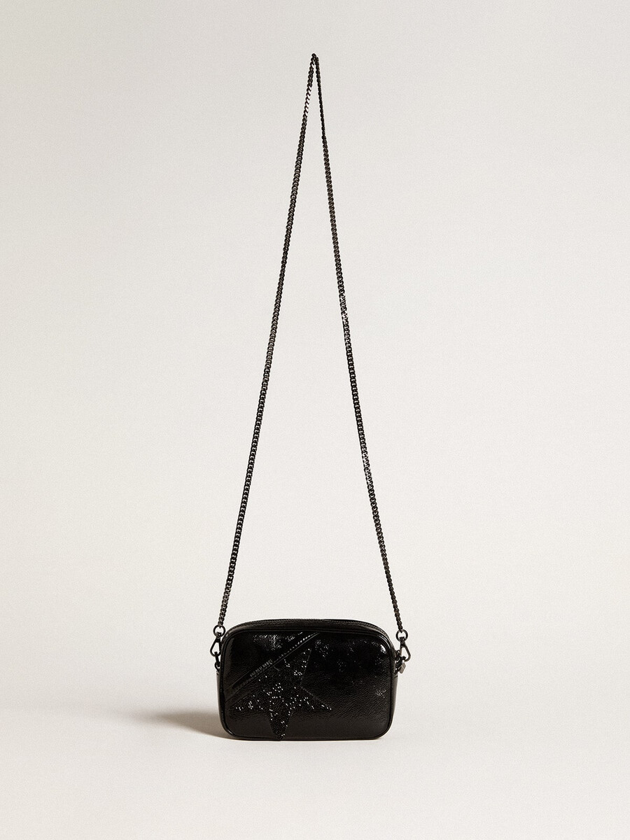 mini star-tasje van zwart leer met swarovski-kristallen ster.