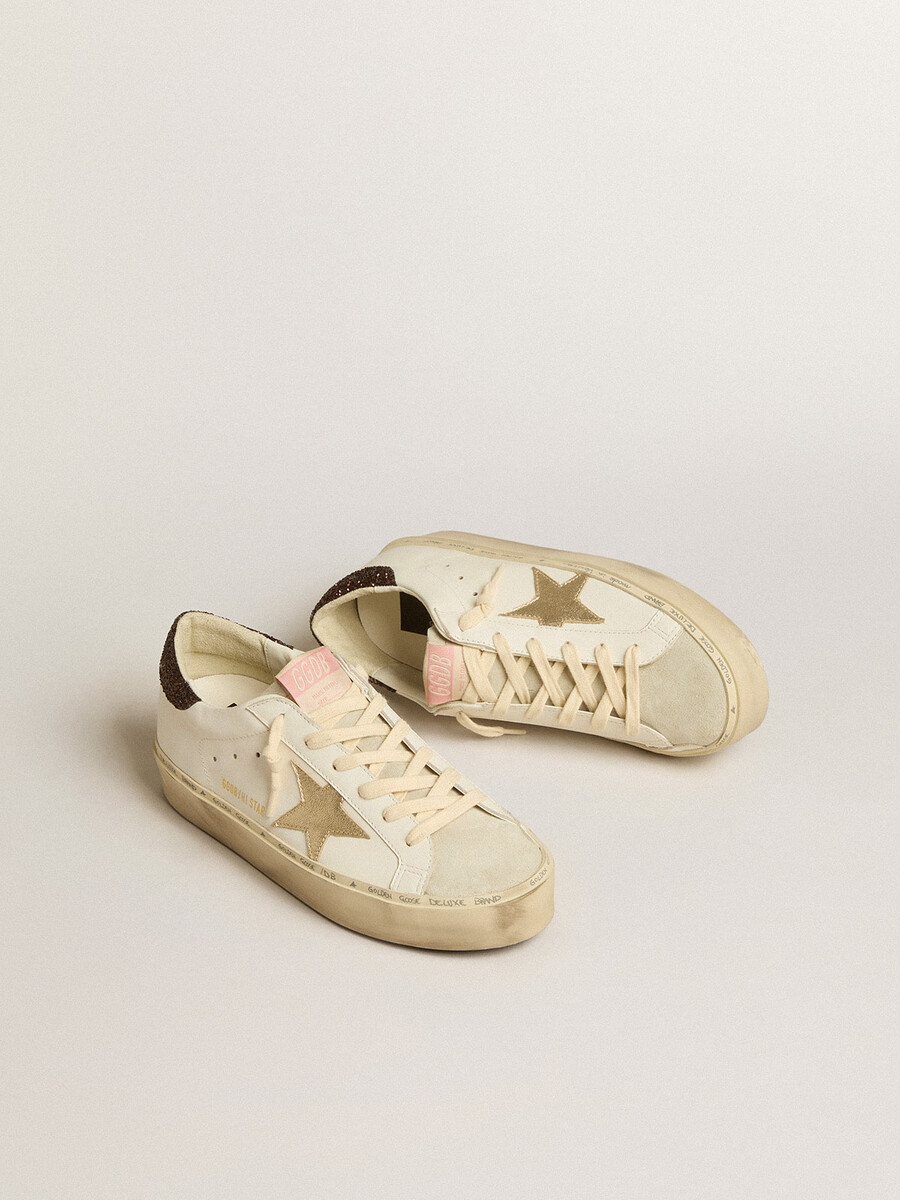 hi star met een ster van platina metallic leer en een hielstuk met glitter.