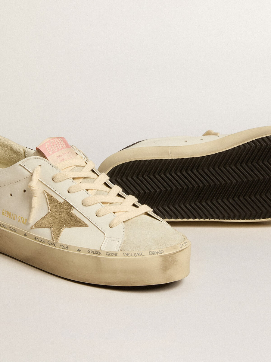 hi star met een ster van platina metallic leer en een hielstuk met glitter.