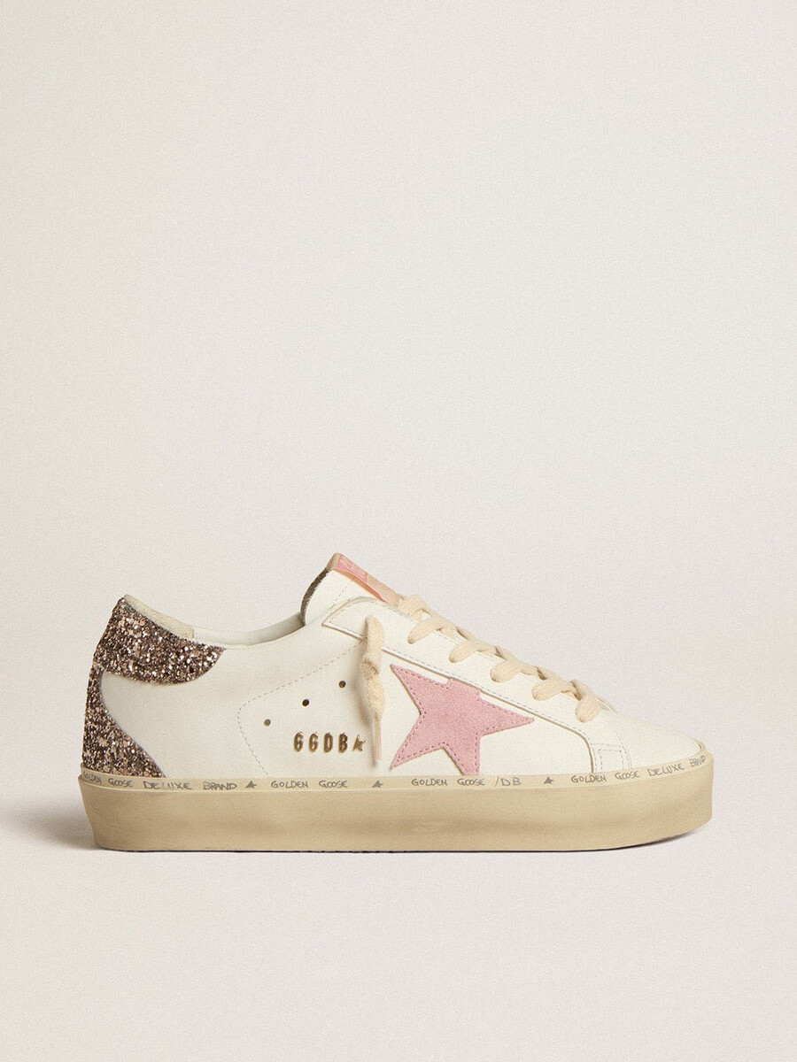 hi star in wit leer met roze suède ster en roze glitter hielstuk.