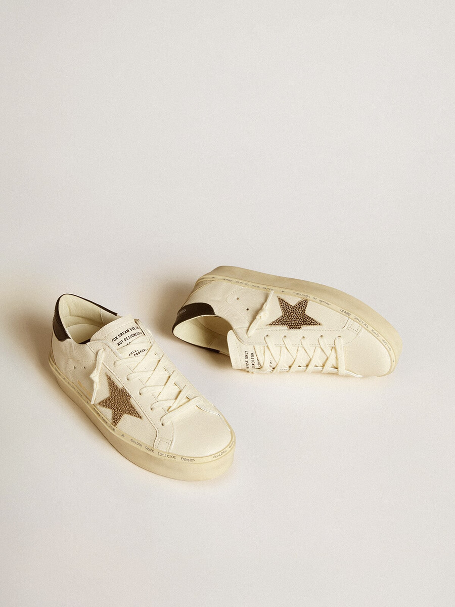 hi star met swarovski kristallen ster en zwart leren hielstuk.