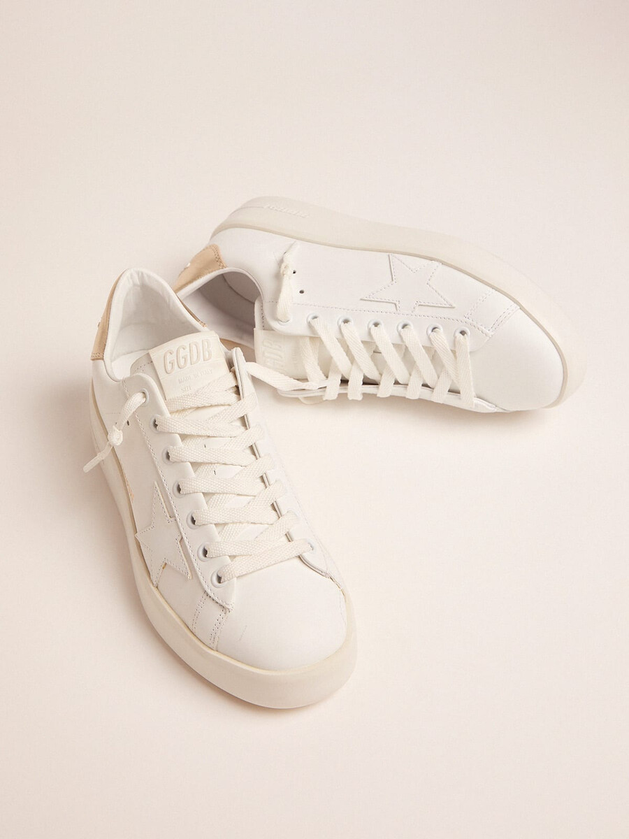 purestar sneakers voor dames met een goudkleurig hielstuk.