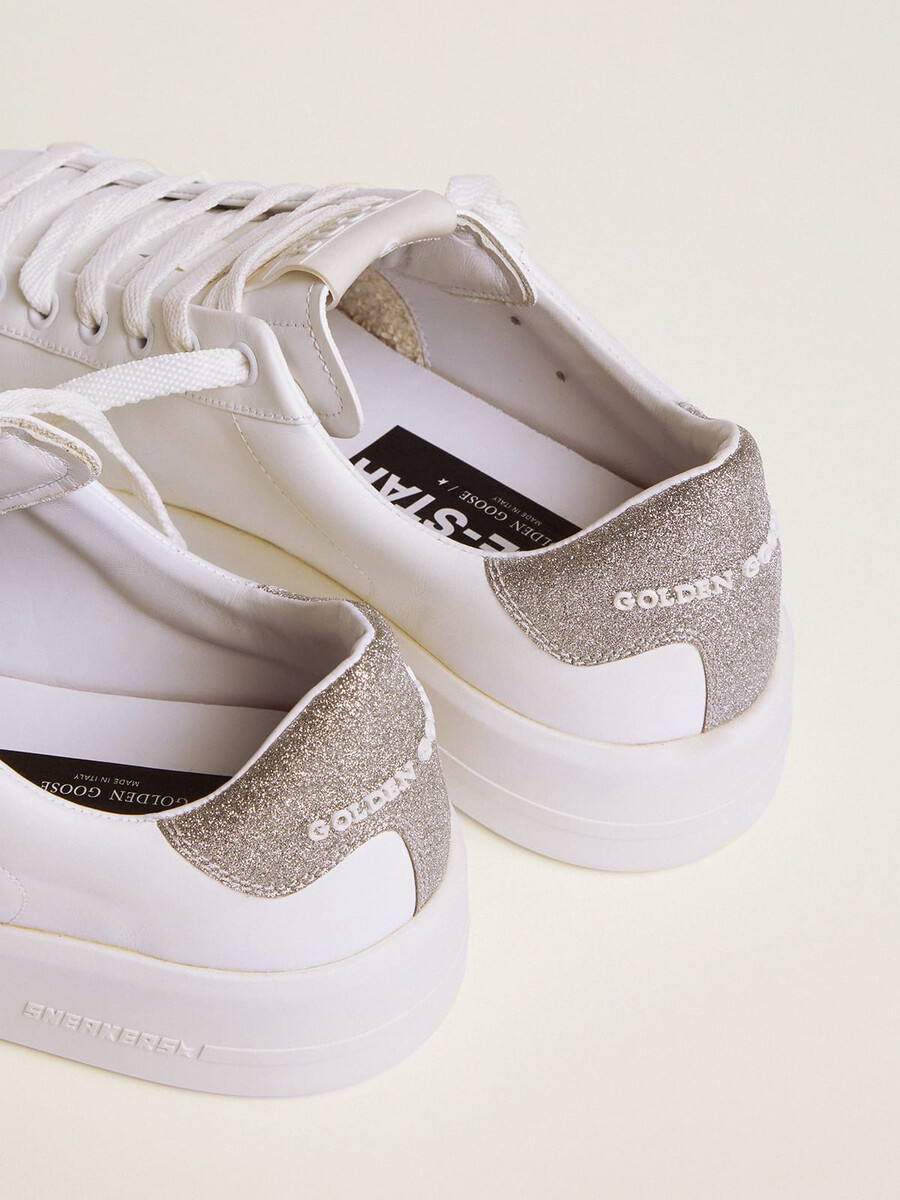 purestar sneakers voor dames met een glinsterend zilverkleurig hielstuk.