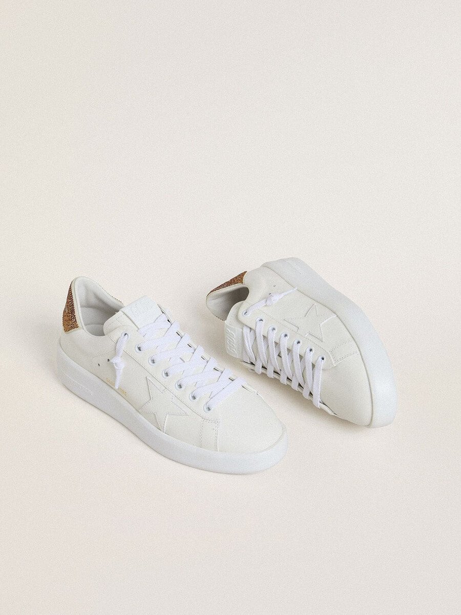 dames purestar met witte leren ster en bruine kristallen hielband.