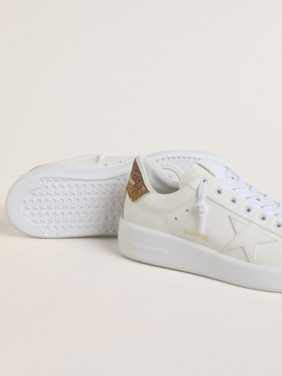 dames purestar met witte leren ster en bruine kristallen hielband.