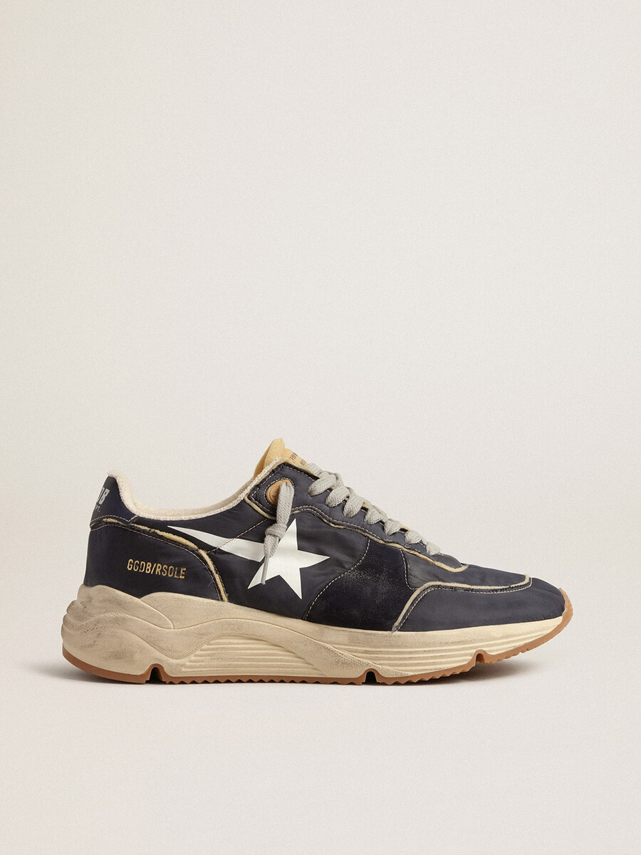 hardloopzool van blauw nylon met witte sterrenprint.