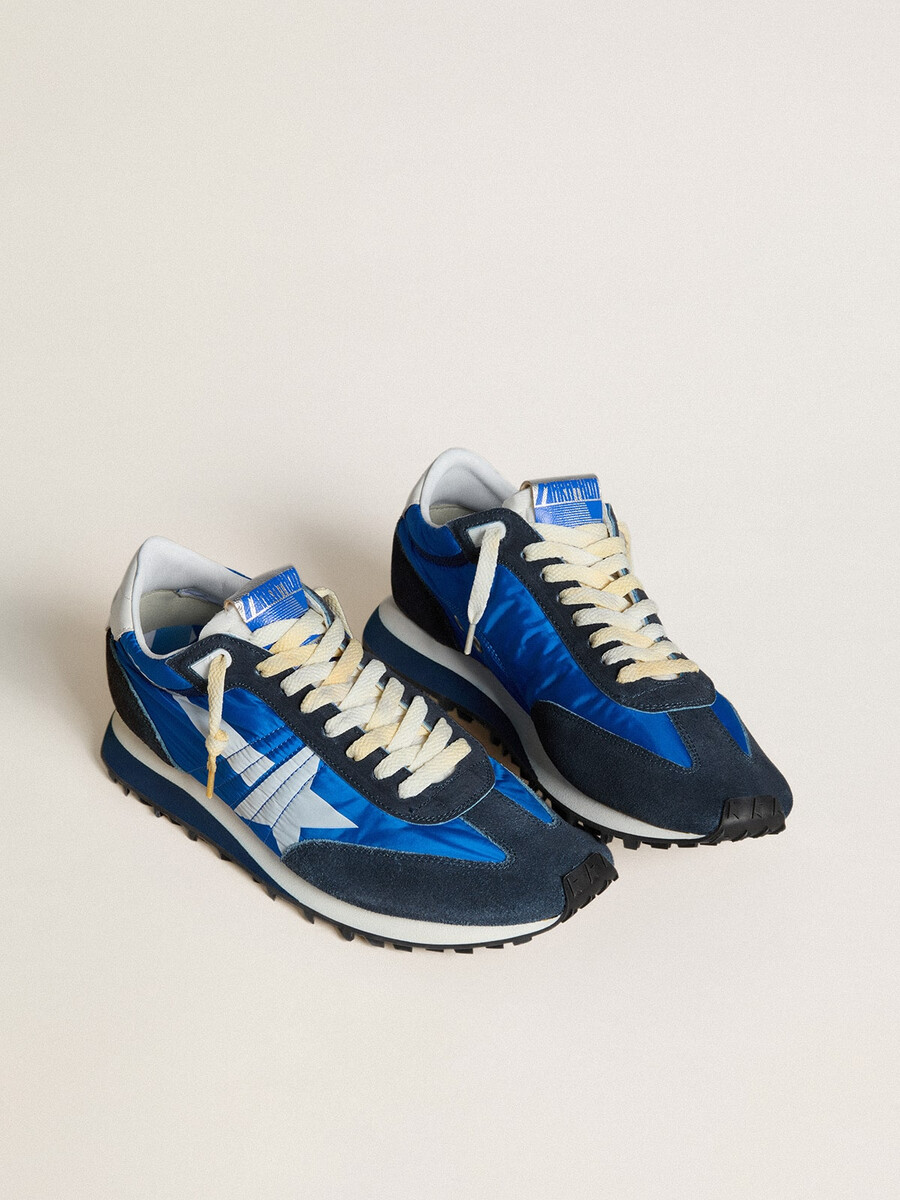 marathon herenschoen met blauw nylon bovenwerk en witte ster.