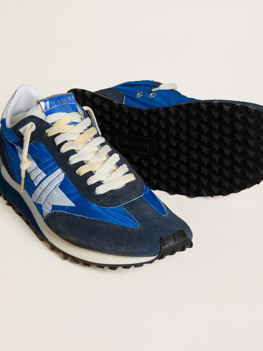 marathon herenschoen met blauw nylon bovenwerk en witte ster.