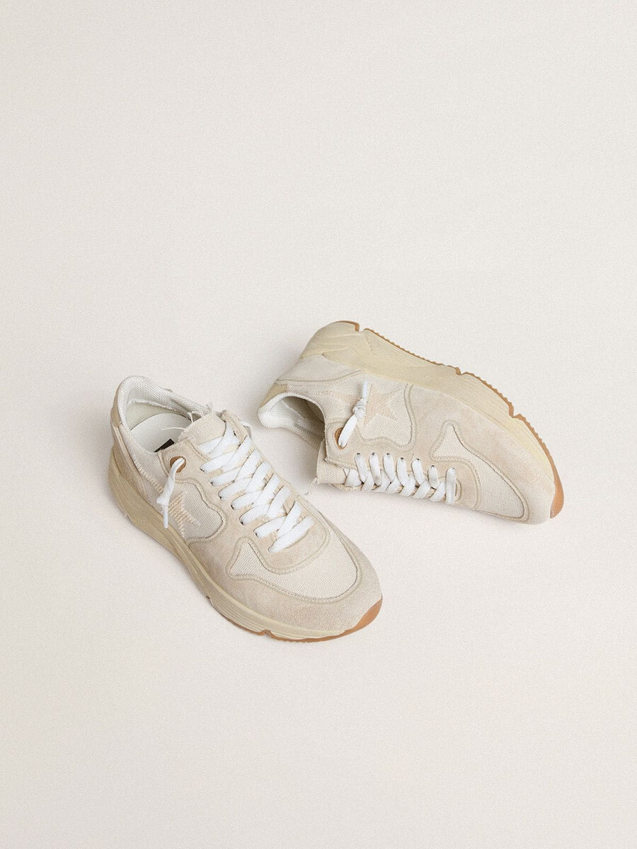dames hardloopschoenzool van canvas met beige ster en platina metallic leren hielstuk.
