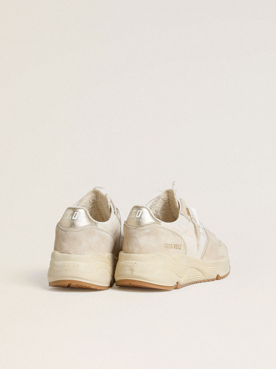 dames hardloopschoenzool van canvas met beige ster en platina metallic leren hielstuk.