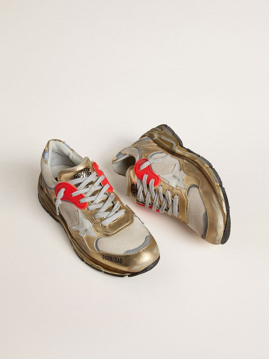 dames dad-star van mesh en goudkleurig leer met witte leren ster.