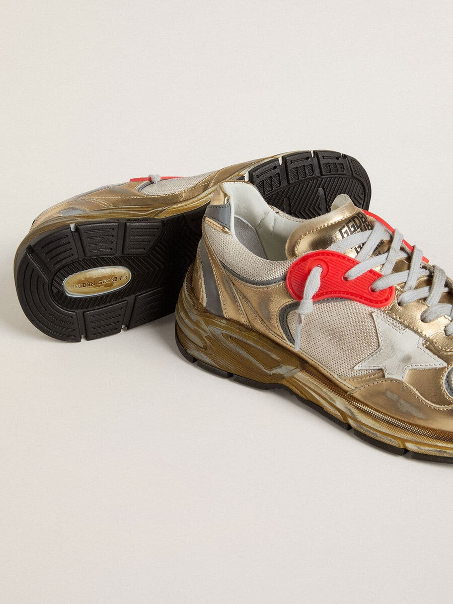 dames dad-star van mesh en goudkleurig leer met witte leren ster.