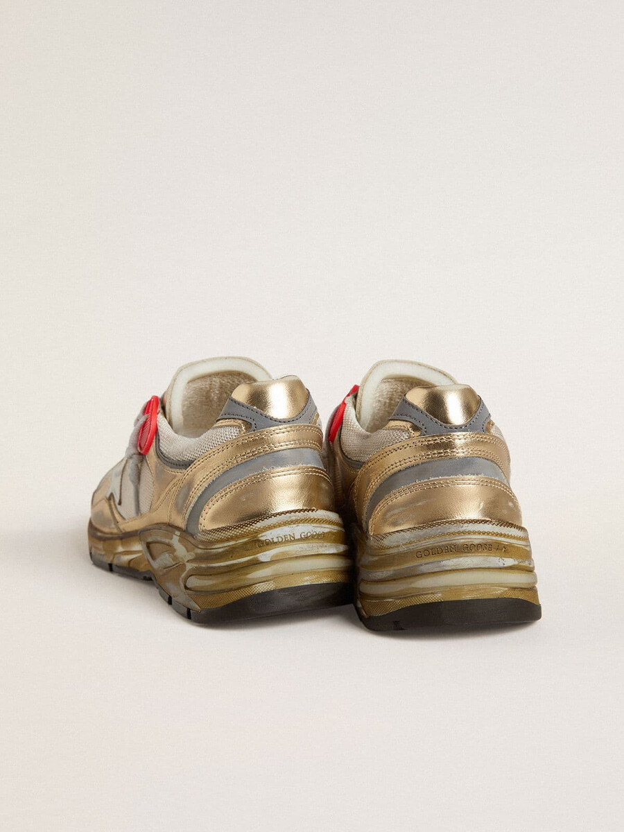 dames dad-star van mesh en goudkleurig leer met witte leren ster.
