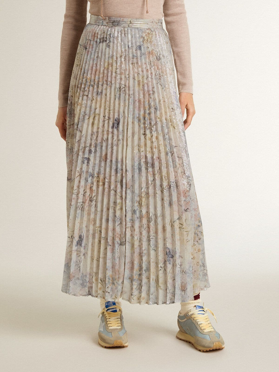 lange geplooide damesrok met veelkleurige bloemenprint van pailletten.