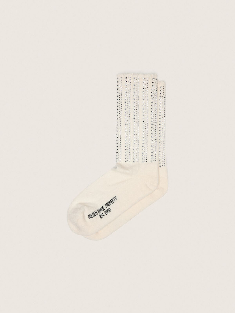 crèmekleurige sokken met een verweerde look en strass-steentjes.