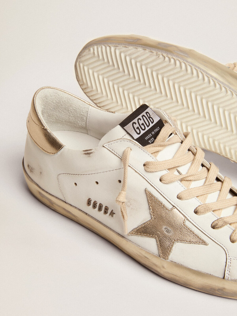 heren super-star met gouden glitterrand en letters.