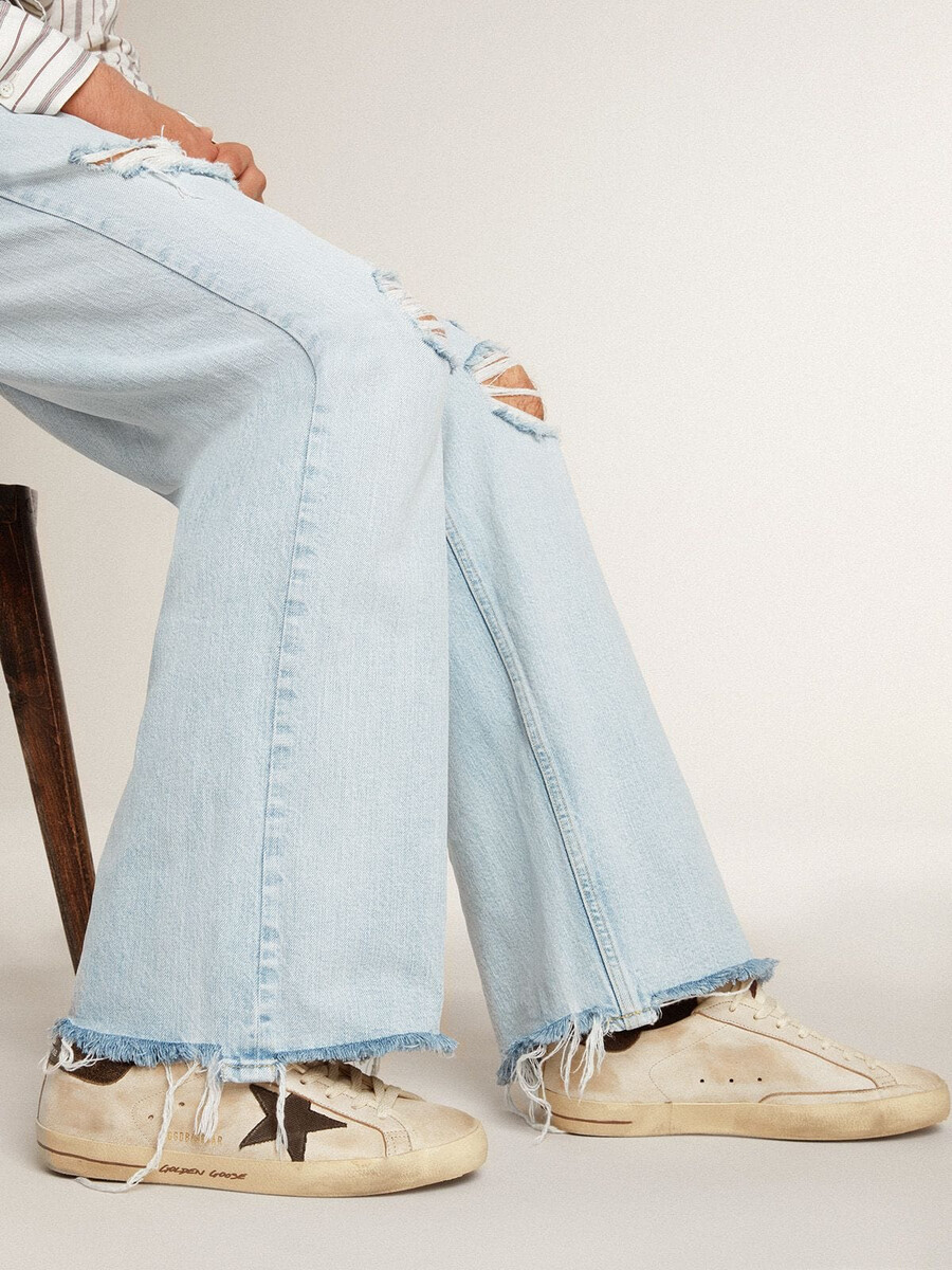 heren super-star in leer met zwarte denim ster en zwarte leren hielstuk.