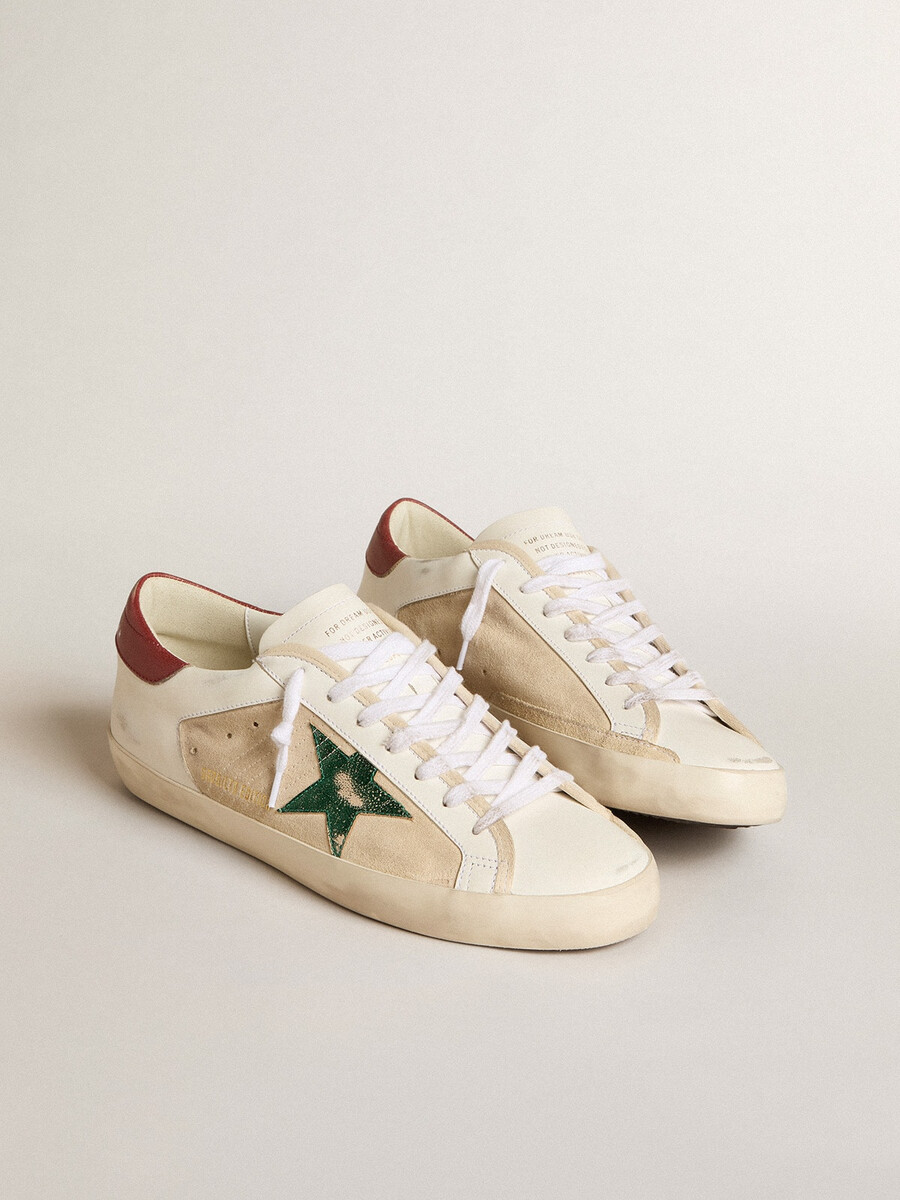 heren super-star ltd in suède met groene metallic ster en rode hielband.