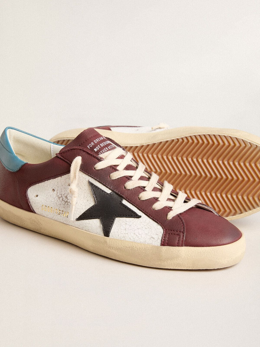 heren super-star in craquelé leer met bruine ster en turquoise hielstuk.